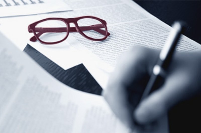Hand signing a regulatory document